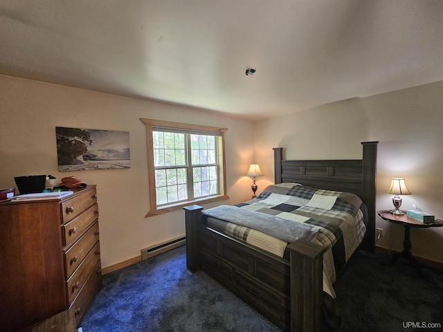 bedroom with dark colored carpet, a baseboard radiator, and baseboards