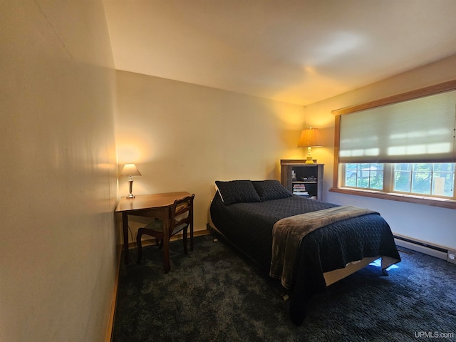 bedroom with dark colored carpet