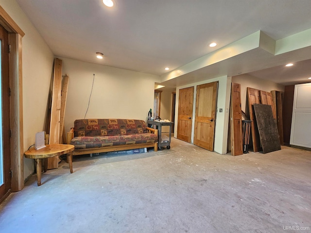 living room with concrete flooring