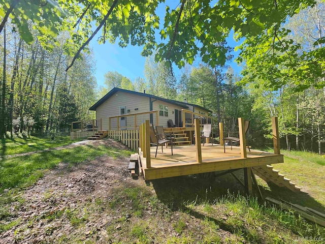 exterior space featuring a wooden deck