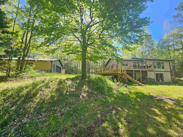 view of yard featuring a deck