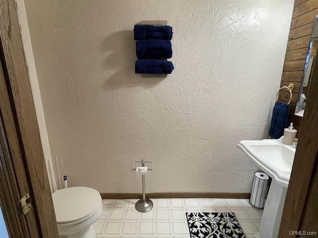 bathroom featuring toilet