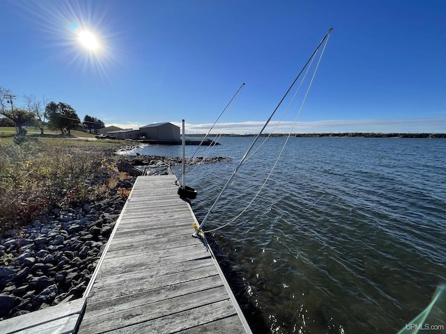 view of dock featuring a water view