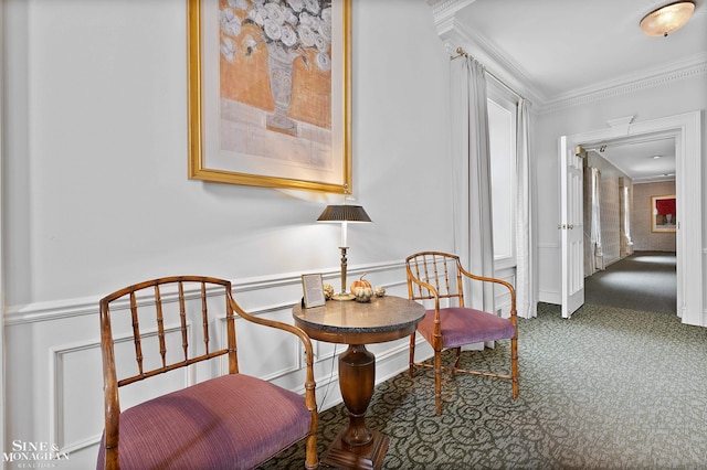 living area featuring crown molding, plenty of natural light, and carpet floors