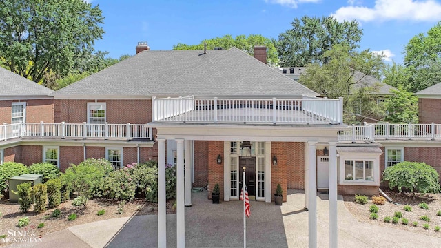 exterior space featuring a balcony