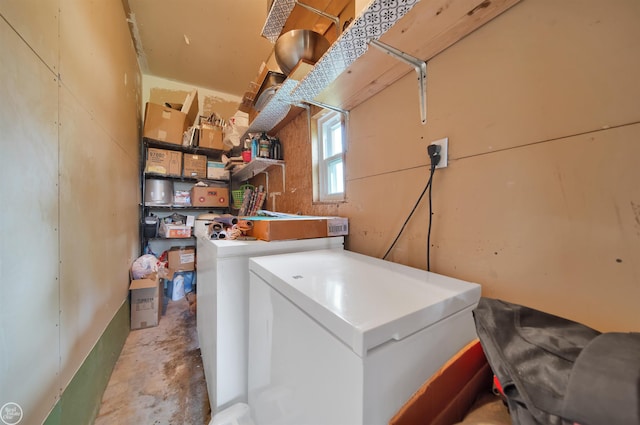 clothes washing area featuring independent washer and dryer