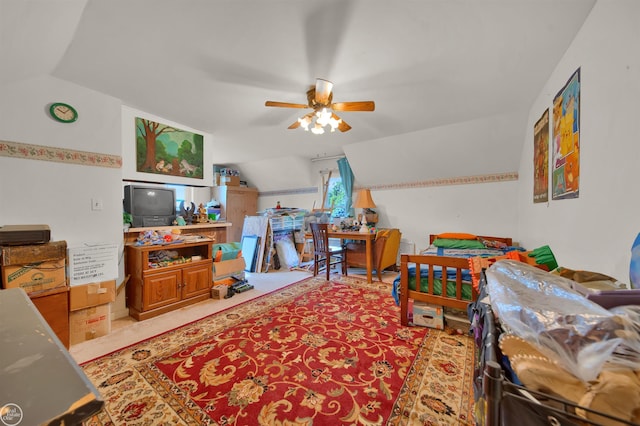 bedroom featuring ceiling fan and vaulted ceiling