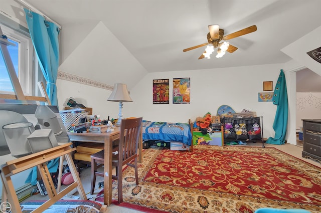 bedroom featuring ceiling fan and carpet