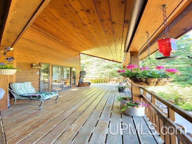 wooden terrace featuring french doors