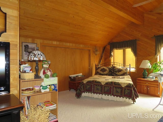 carpeted bedroom featuring vaulted ceiling, wooden ceiling, and wooden walls