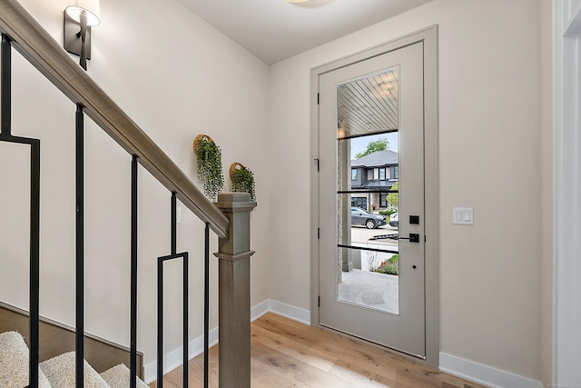 foyer with light hardwood / wood-style flooring