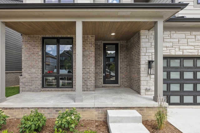 doorway to property featuring covered porch