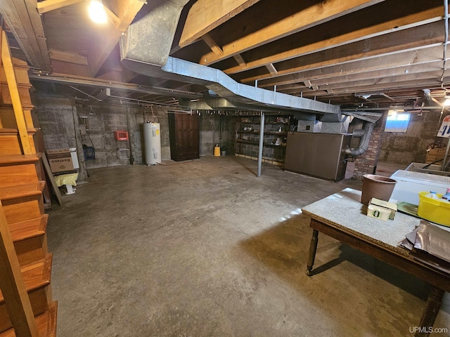 basement featuring electric water heater