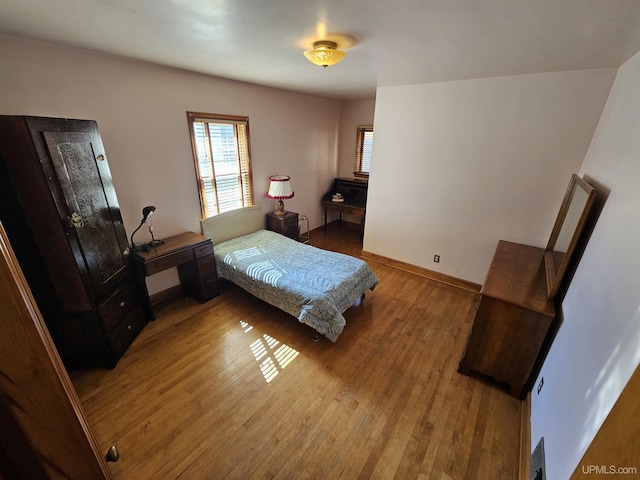 bedroom featuring hardwood / wood-style flooring