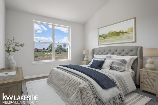 carpeted bedroom with vaulted ceiling