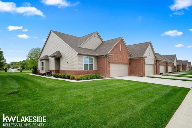 view of front facade with a garage, central AC unit, and a front lawn