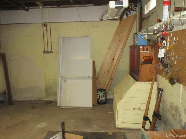 basement with a workshop area