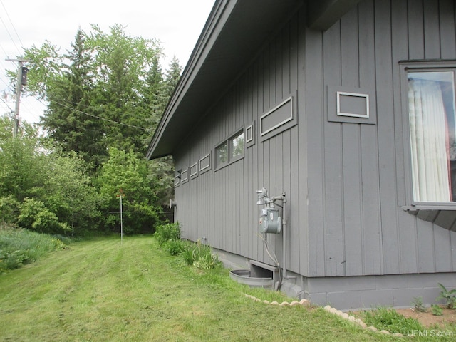 view of home's exterior featuring a lawn