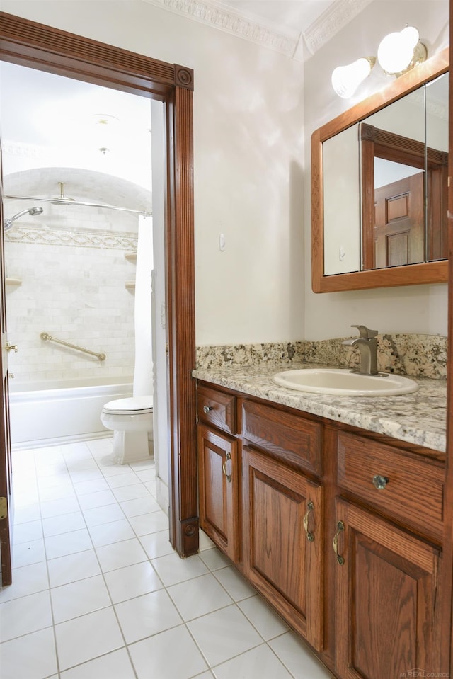 full bathroom featuring shower / bath combo with shower curtain, tile floors, ornamental molding, toilet, and vanity