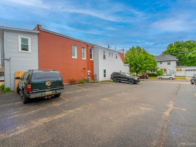 view of front of house featuring cooling unit