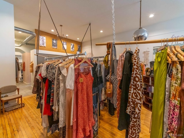 spacious closet featuring hardwood / wood-style floors