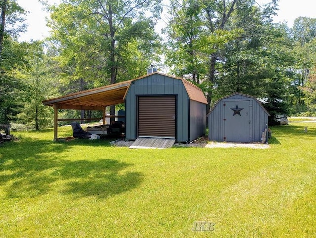 view of outbuilding with a yard and a carport