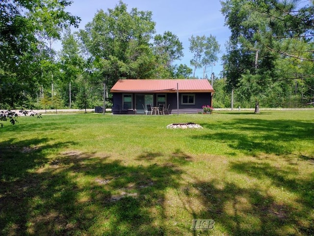 view of front of home with a front yard