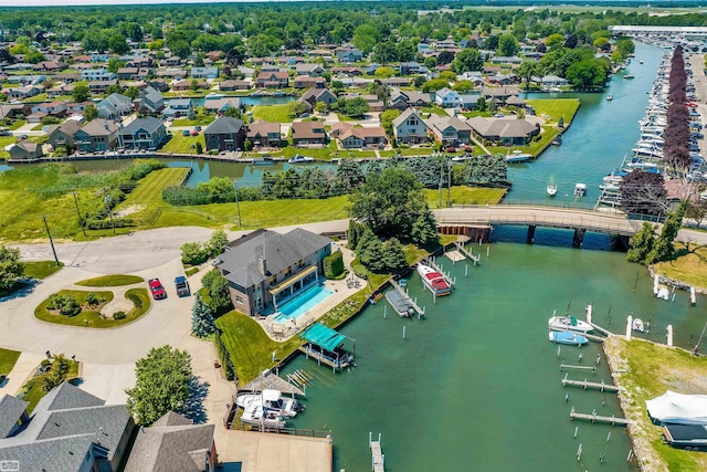 bird's eye view with a water view