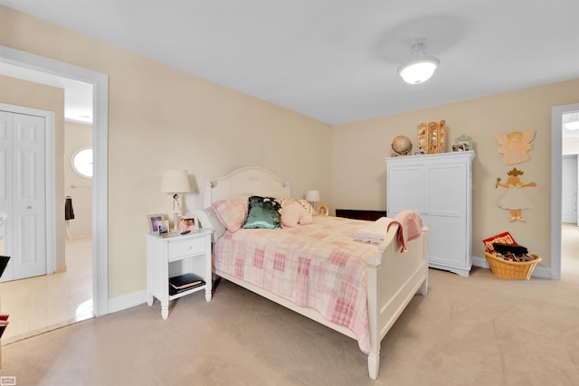 bedroom with light colored carpet