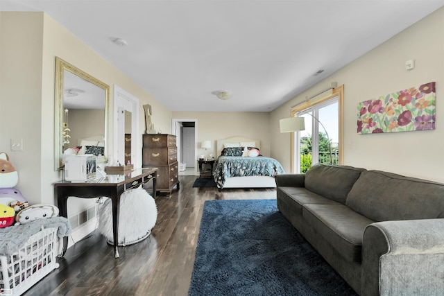 bedroom featuring dark hardwood / wood-style floors