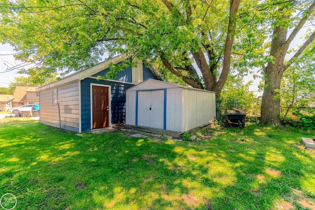 view of outbuilding with a lawn