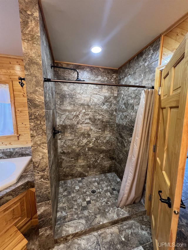 bathroom with ornamental molding and a shower with curtain