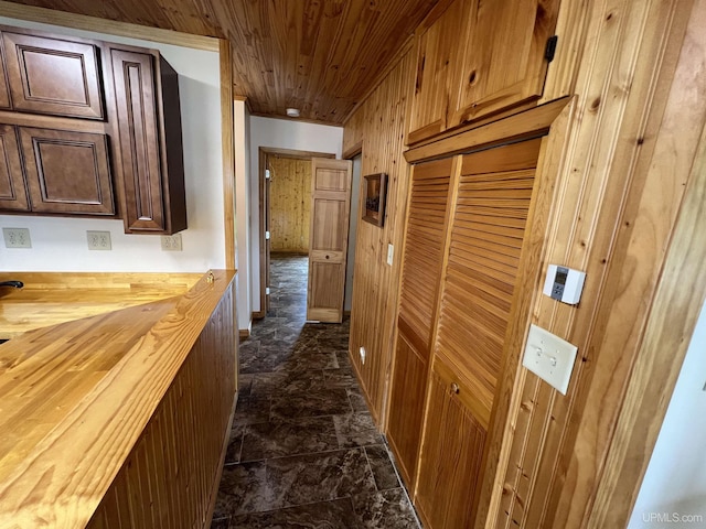 corridor featuring wooden ceiling