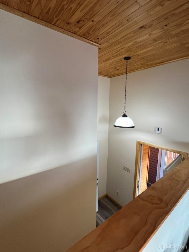 interior space with wood-type flooring and wood ceiling