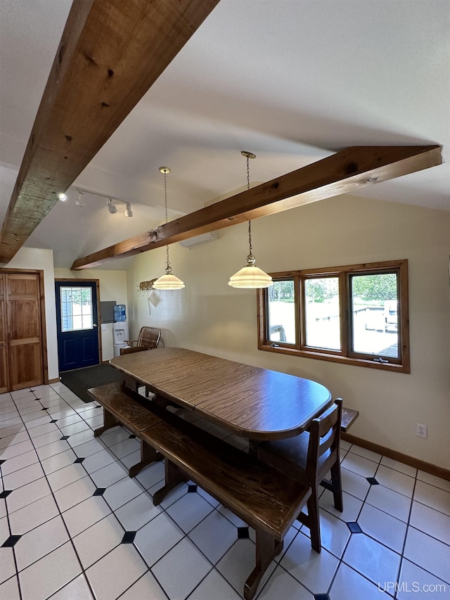 unfurnished dining area featuring lofted ceiling with beams and rail lighting