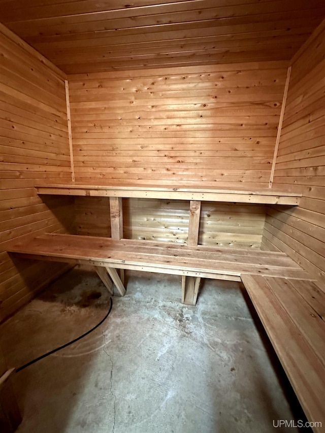 view of sauna with concrete flooring