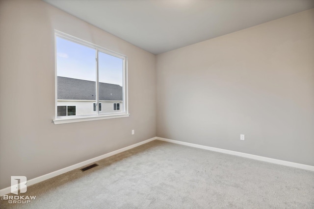 unfurnished room featuring carpet floors