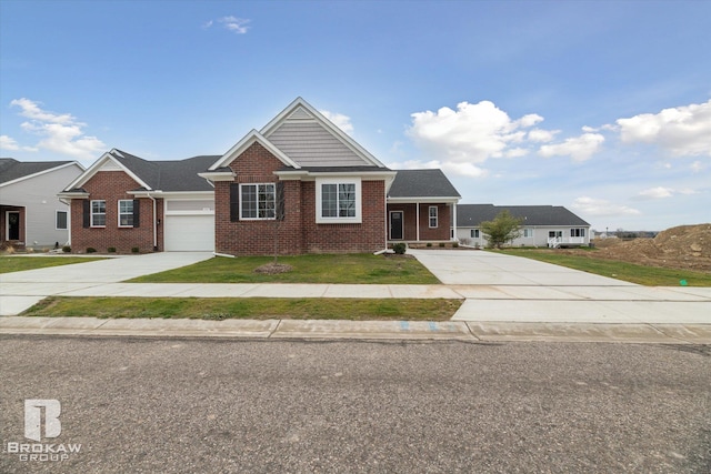 view of front facade featuring a front lawn and a garage