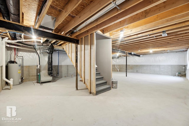 basement featuring heating unit and water heater