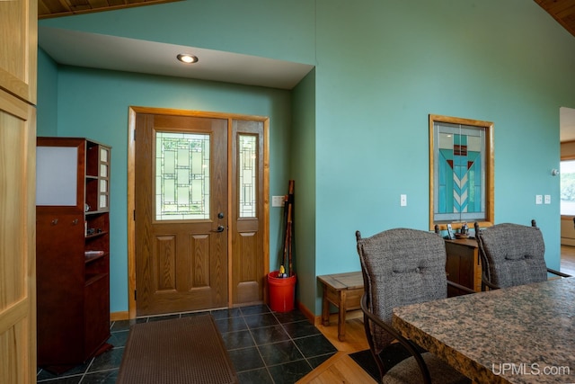 entryway featuring lofted ceiling and wooden ceiling