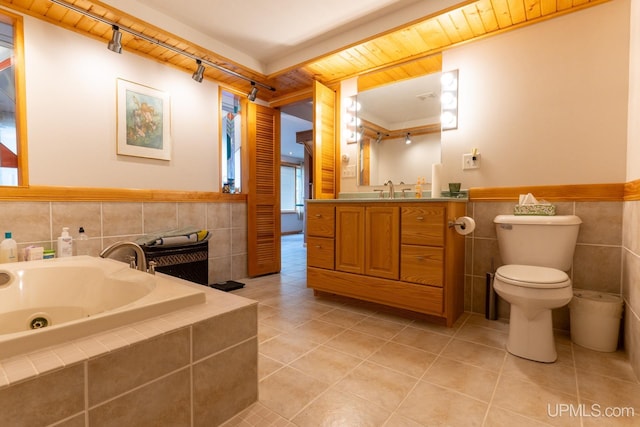 bathroom featuring a tub to relax in, tile walls, tile patterned floors, wooden ceiling, and vanity