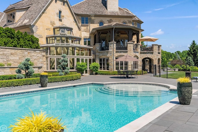 view of swimming pool with a patio