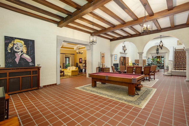 game room with beam ceiling, dark tile patterned floors, and pool table