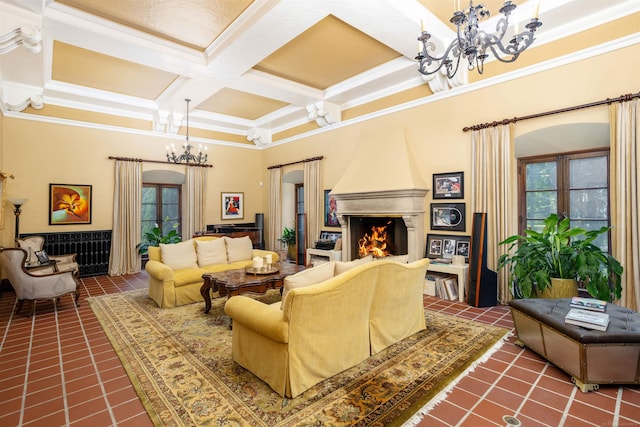 tiled living room featuring beamed ceiling, crown molding, a fireplace, and coffered ceiling