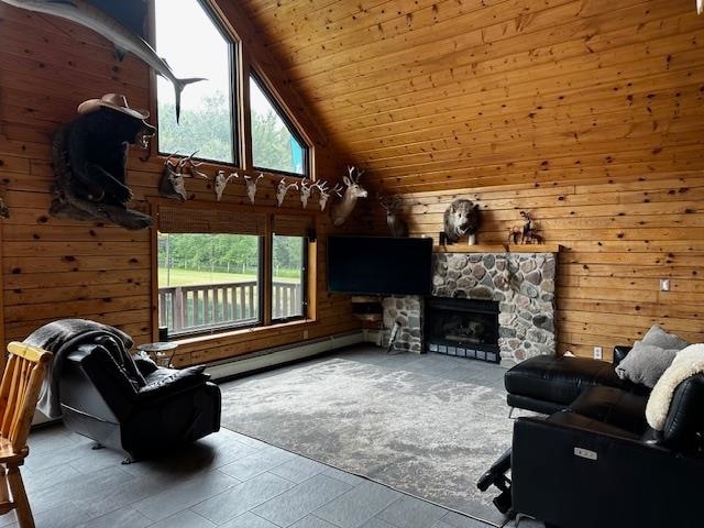 living room featuring wood ceiling, a fireplace, tile patterned flooring, high vaulted ceiling, and a baseboard heating unit