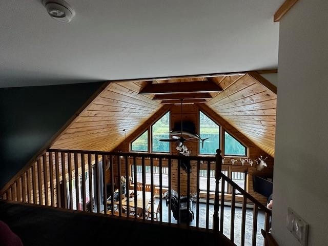 bonus room with wooden ceiling, vaulted ceiling with beams, and ceiling fan