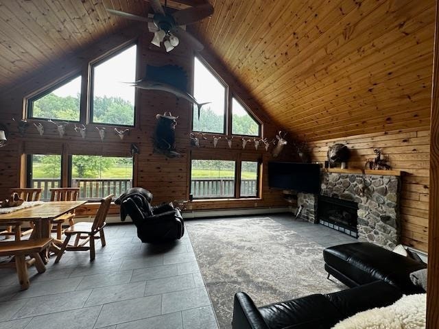 tiled living room with ceiling fan, a stone fireplace, high vaulted ceiling, and wooden ceiling