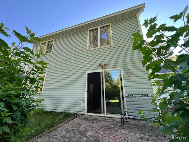 rear view of house with a patio area