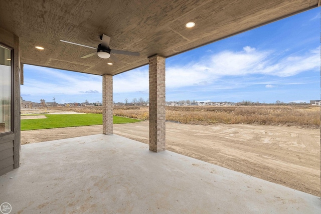 view of patio / terrace featuring ceiling fan