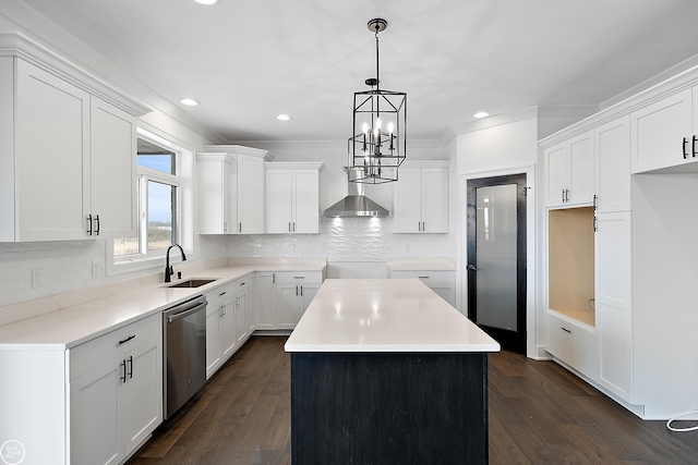 kitchen featuring white cabinets, a center island, and appliances with stainless steel finishes